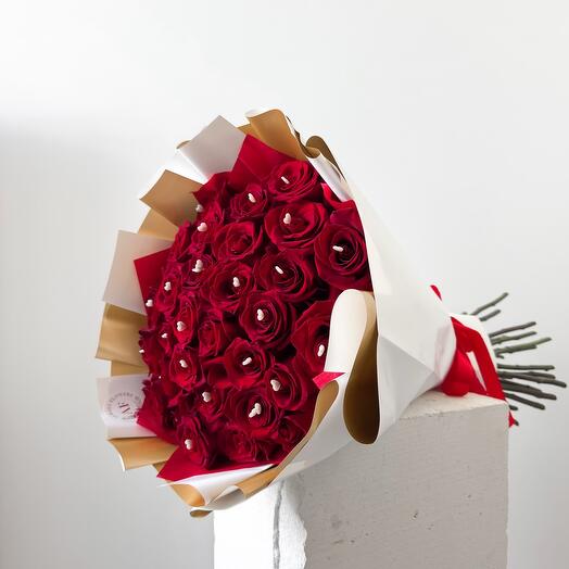 31 red roses with pin hearts