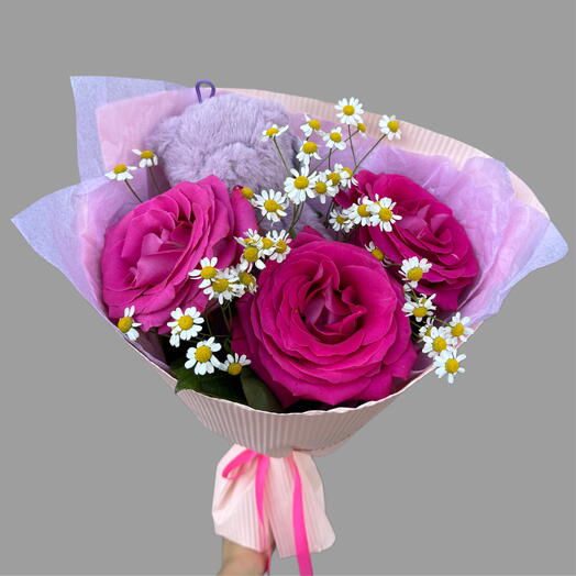 Nice bouquet with a teddy bear