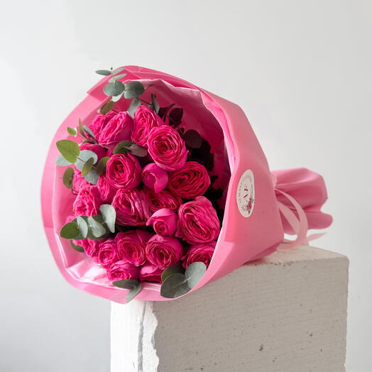 Pink garden spray roses with eucalyptus