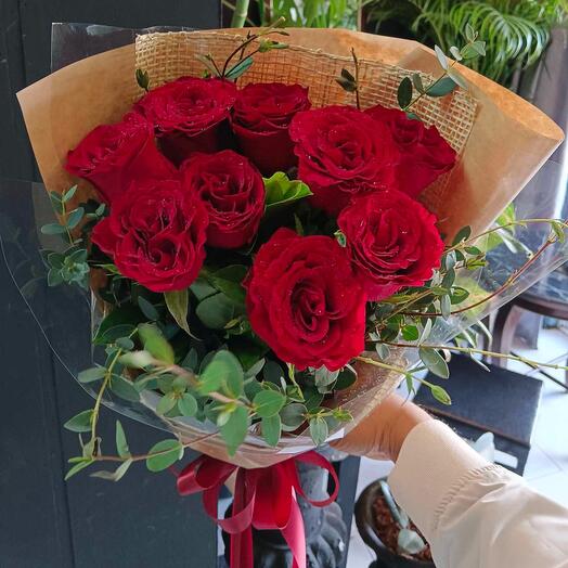 9 red roses with greenery