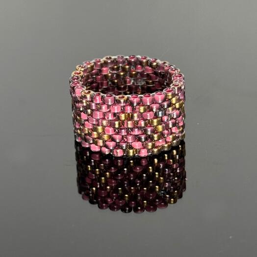 Wide ring made of large beads