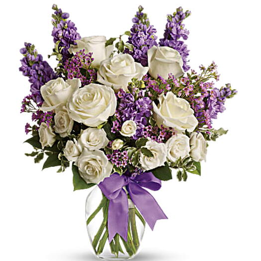 Enchanted Cottage (white roses, lavender stock, wax +vase)
