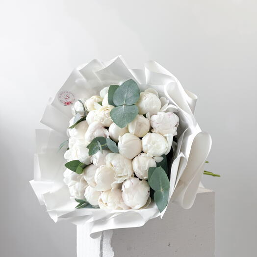 White peonies bouquet with eucalyptus