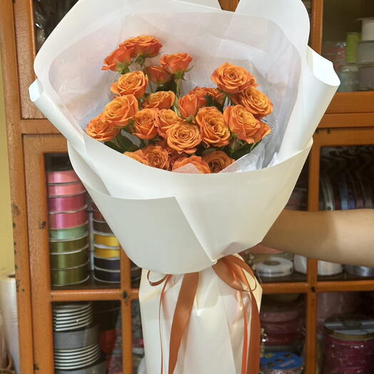 Beautiful orange colored spray rose bouquet