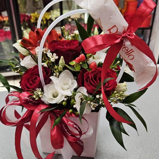 Flowers in a bag with ferrero sweet