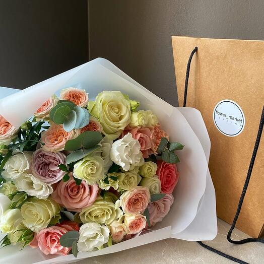 Romantic bouquet in a paper bag