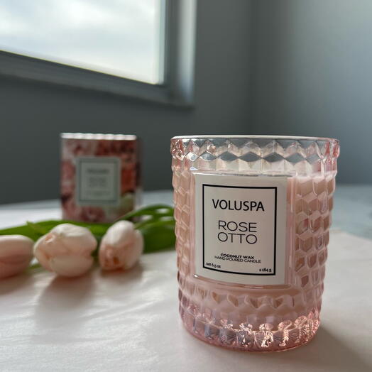 Luxurious scented candle in a glass jar