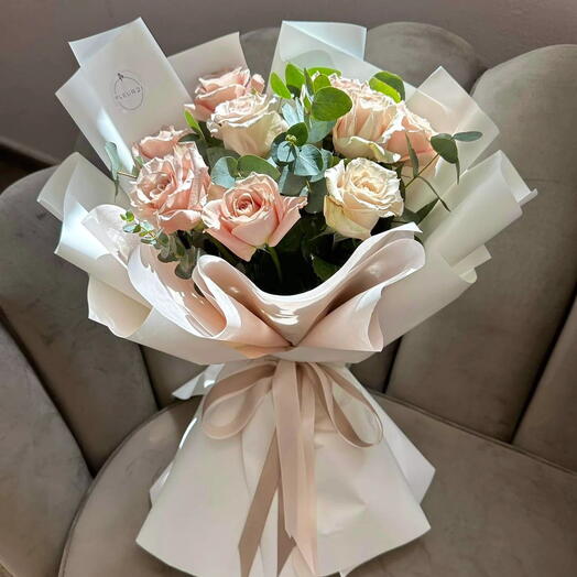 Beige roses with eucalyptus