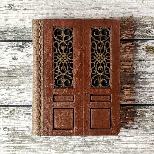 Brown Belgrade door journal with flowers on the bars
