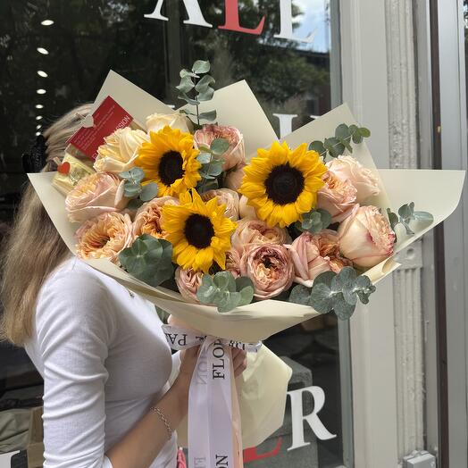 Loving Embrace (peach) garden roses, sunflowers , eucalyptus