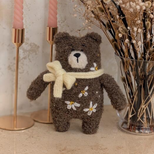 Bear with flowers