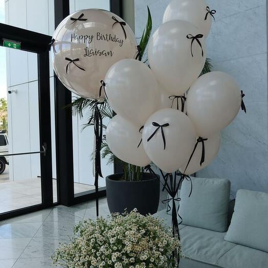 A set of balloons with bows for HER