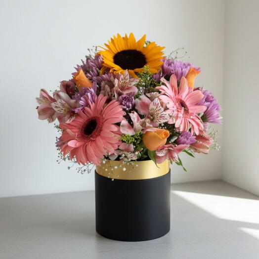 Caja Floral Amanecer de Colores – Girasol, Gerberas y Flores Mixtas en Arreglo Premium