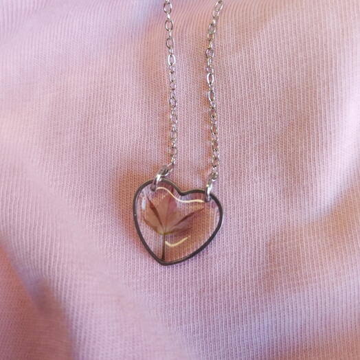 Heart pendant with maple leaf