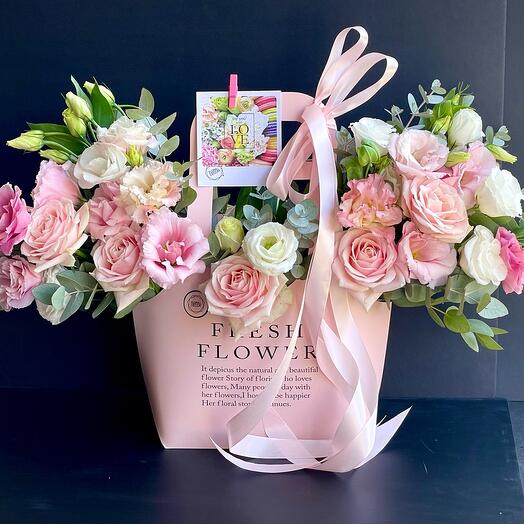 Bouquet in a pink handbag