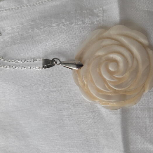 Mary, Carved shell rose