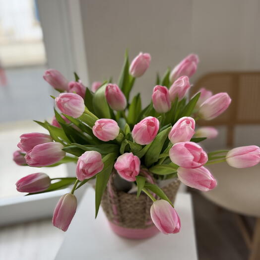 Pink tulips in a basket