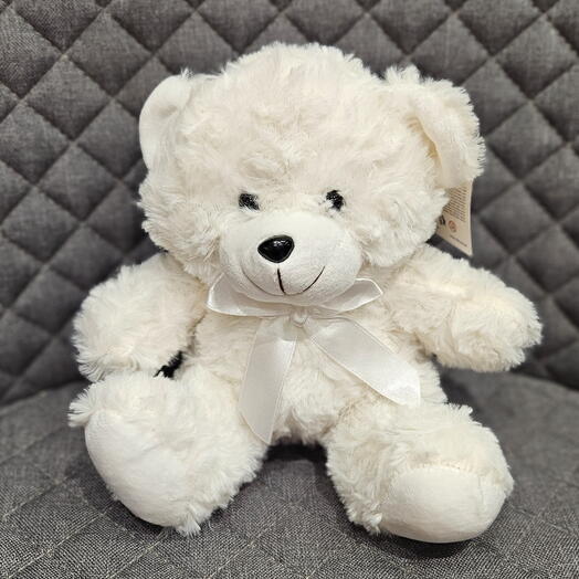 Bear with white bow