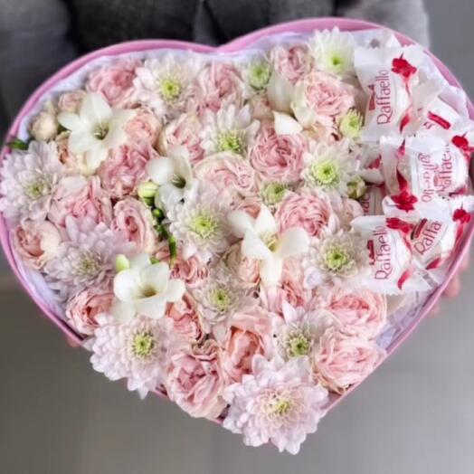 Flowers in a box with candy