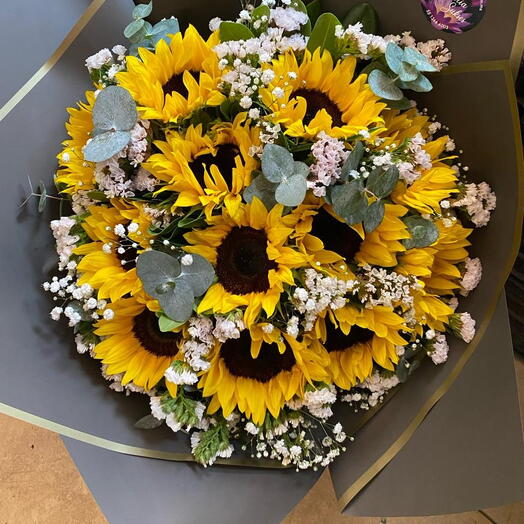 Vuelta al sol con girasoles