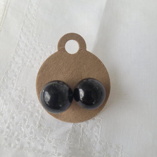 Natalie,  earing in black