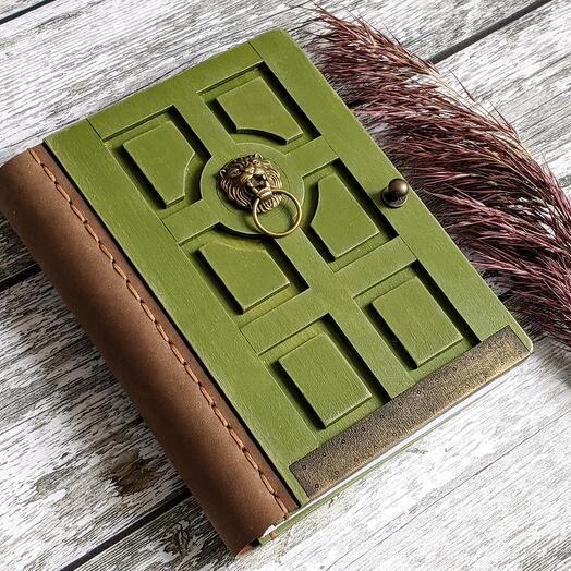 Wooden door journal with a lion
