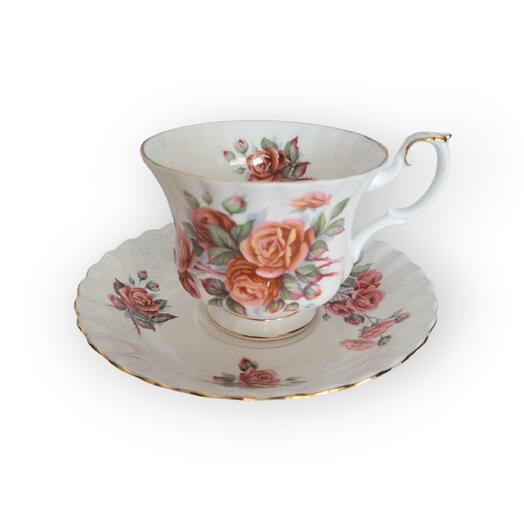 Vintage Collectible Cup and Soucer by Royal Albert flower pattern in orange