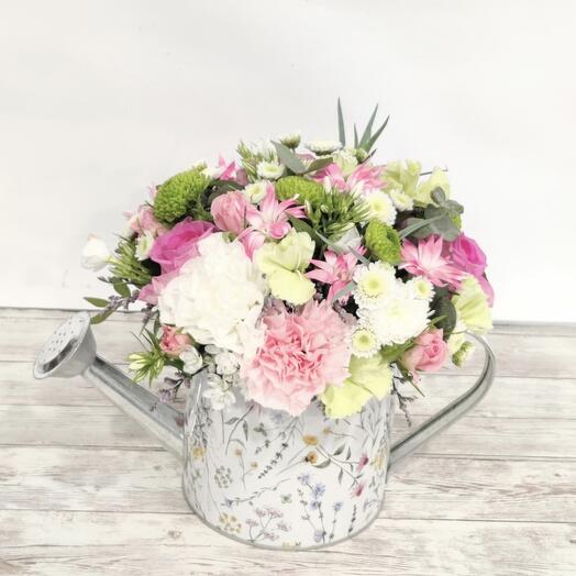 Watering can flowers arrangment