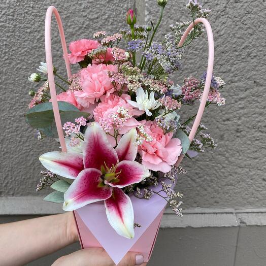 Flowers in a box with lilies