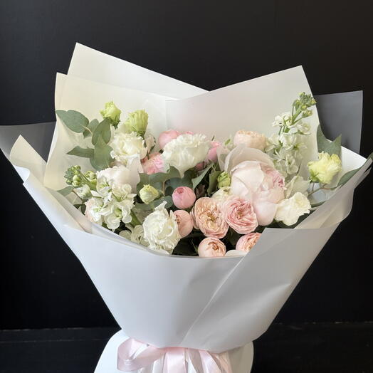 Bouquet with peonies, peony roses, lisianthus and matthiola