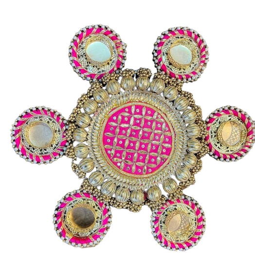 A set of 6 Small candle holders and 1 central rangoli