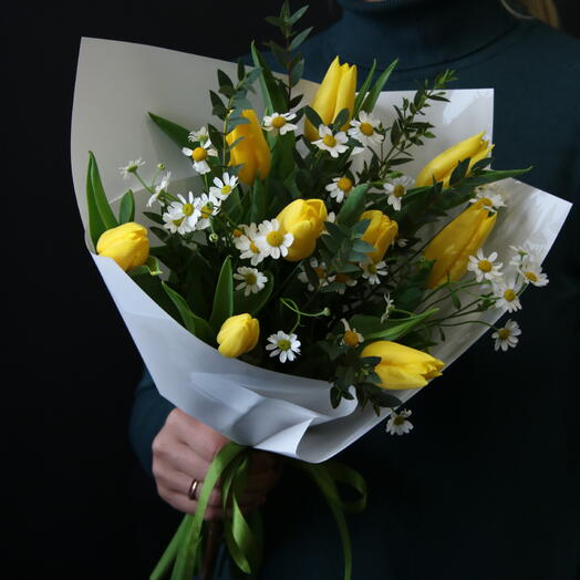 Bouquet with yellow tulips and bush daisies
