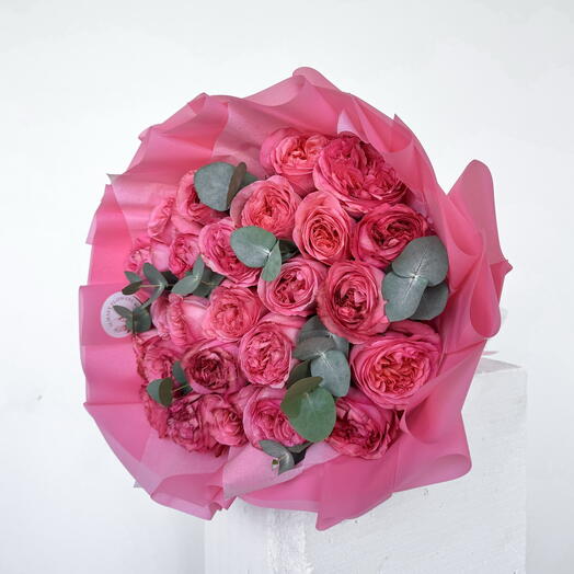 Pink peony roses with eucalyptus