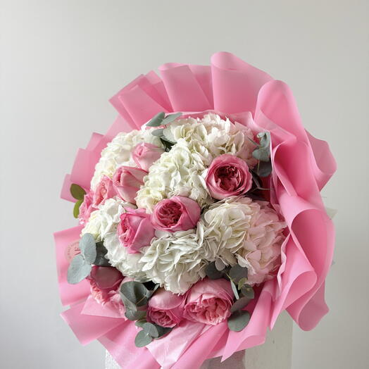 White hydrangeas with peony roses and eucalyptus
