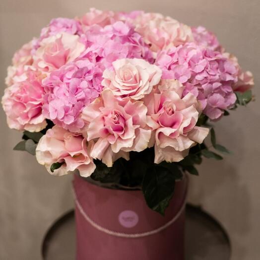 A box of hydrangeas and French roses