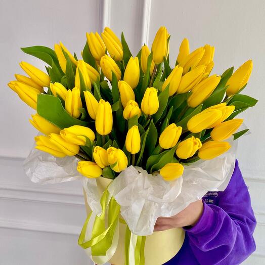 51 yellow tulips in a box