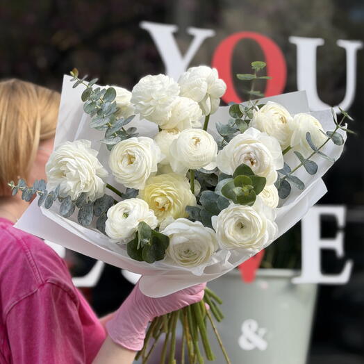 20 white ranunculus and eucalyptus