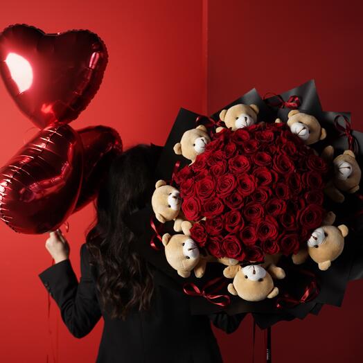Red roses with teddy