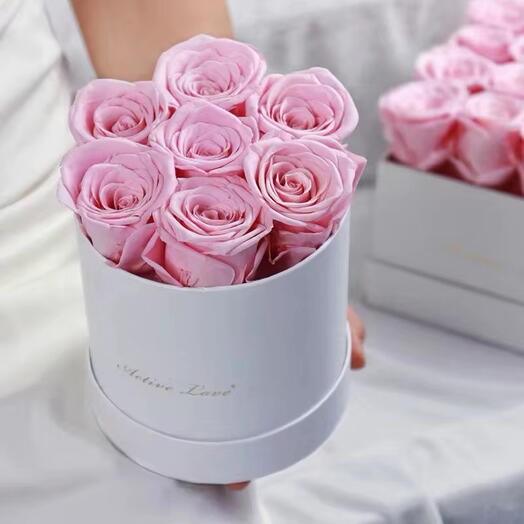7 Eternal Pink roses in beautiful black box