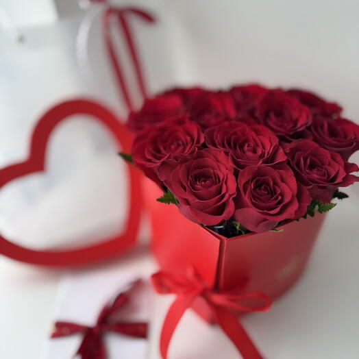 Flowers in a box with chocolate covered strawberries