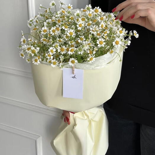 Букет из ромашек в оформлении