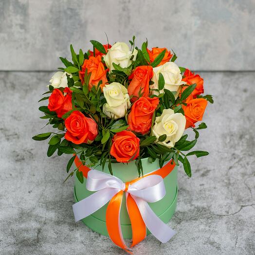 15 orange and white roses in a box