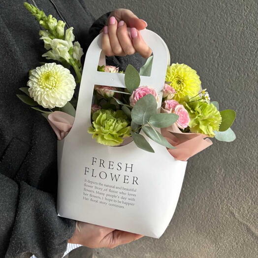 Bright spring bouquet in a bag
