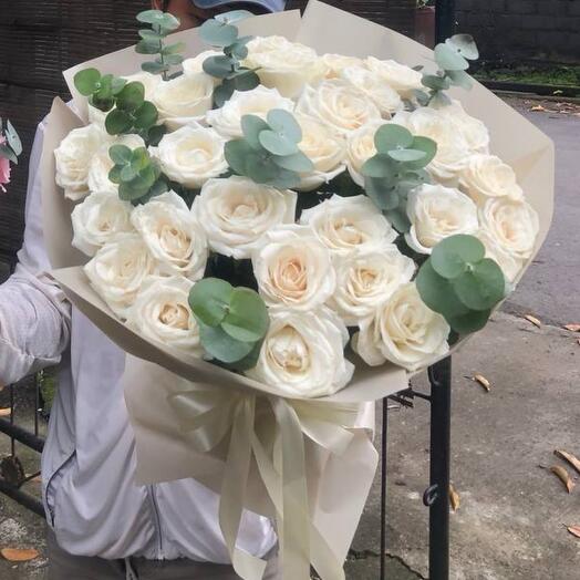 31 white roses with eucalyptus