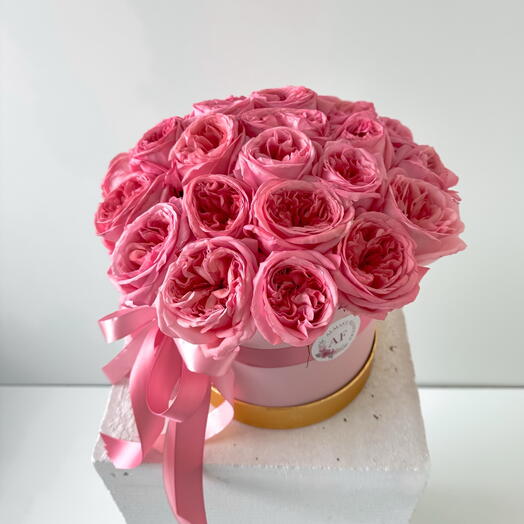 Pink peony roses in a box