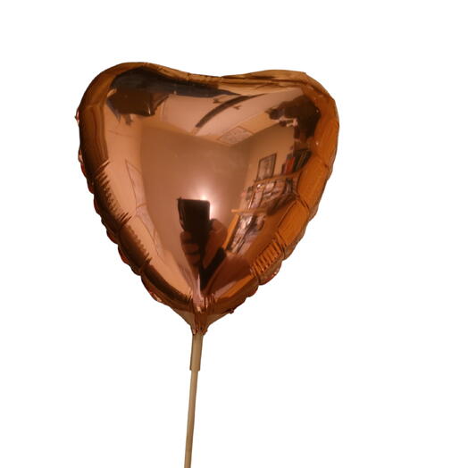 A balloon on stick heart