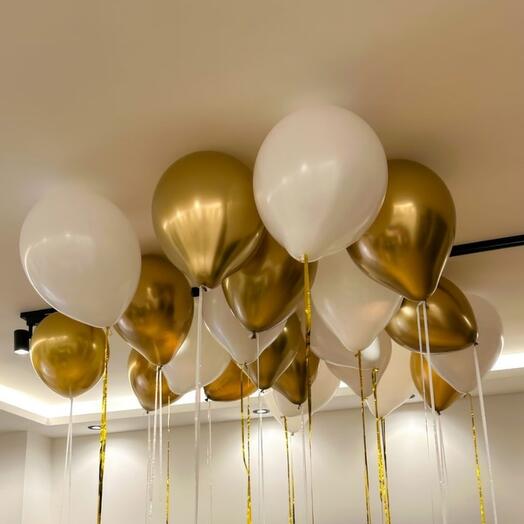Balloons under the ceiling white and gold