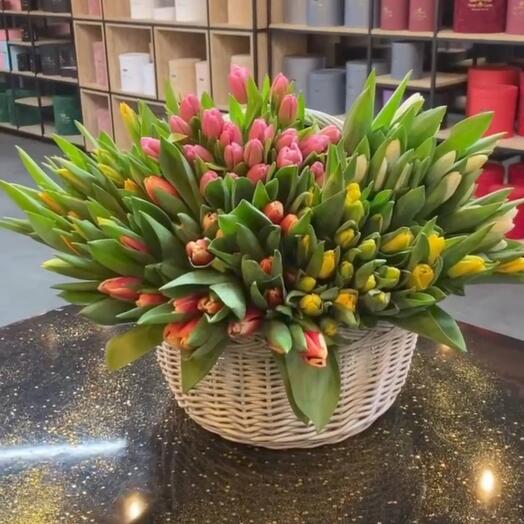 Basket with mult-icolored tulips 101 pcs