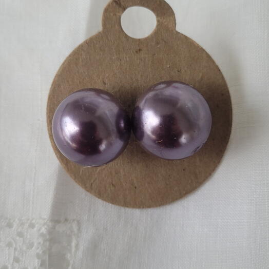 Natalie earing purple