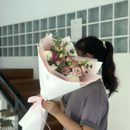 Bouquet with purple eustoma and dianthuses